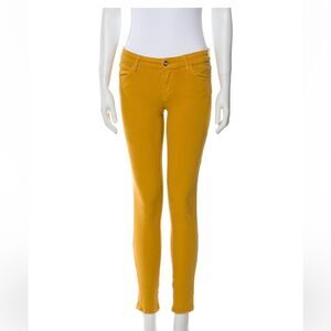Koral Yellow/ Gold Skinny Jeans with ankle zippers. Size 28.